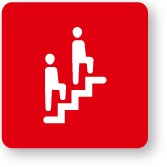 grafické znázornenie dvoch ľudí na červenom pozadí, ktorí kráčajú po schodoch nahor
