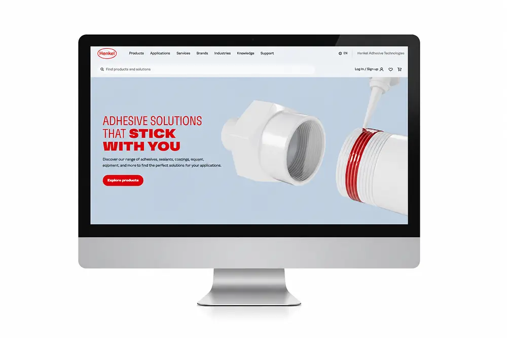Obrazovka monitora, na ktorej je zobrazená webová stránka divízie Adhesive Technologies. 